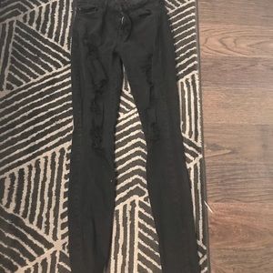 Black distressed skinny jeans